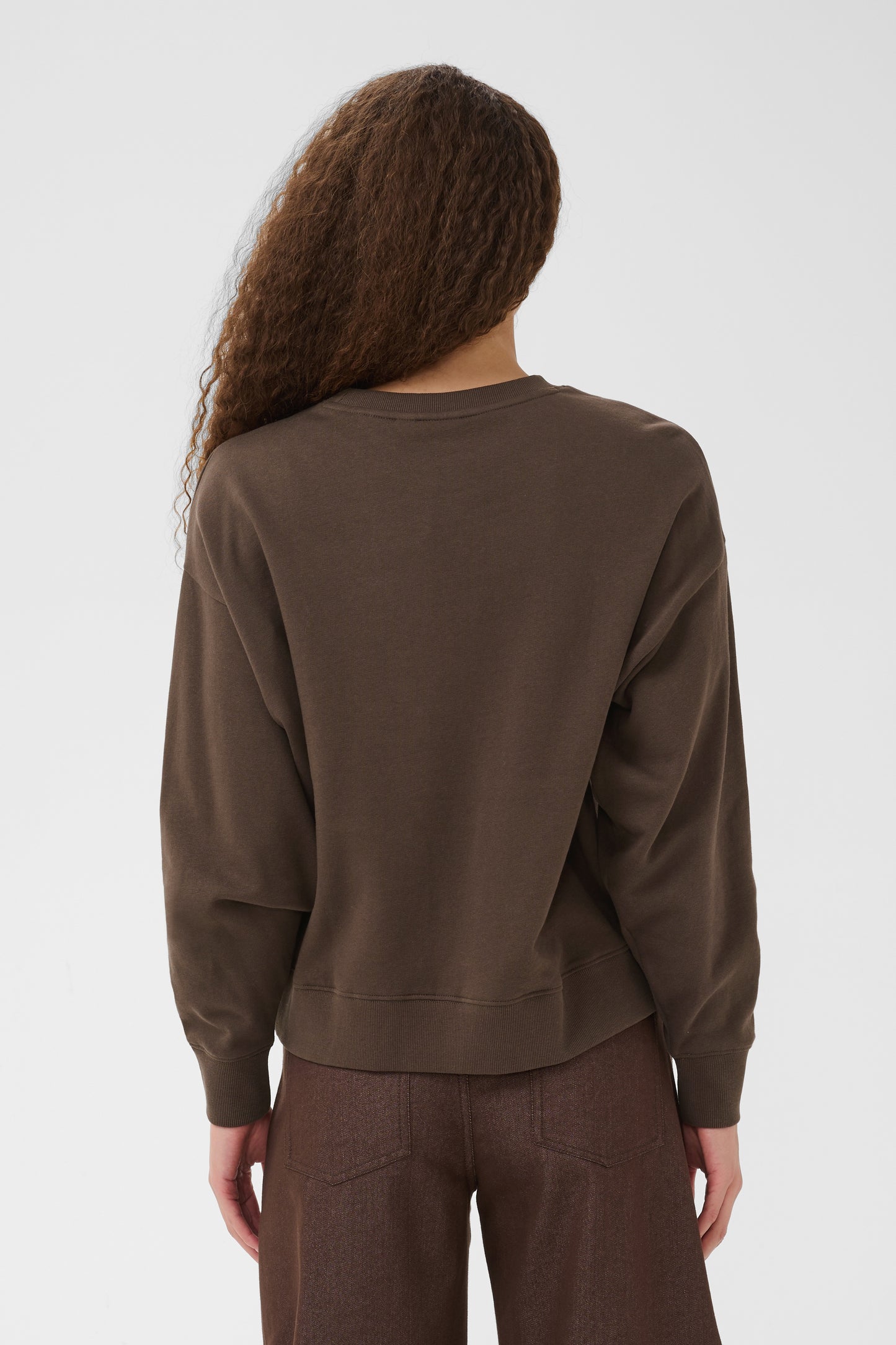 Brown Saint Tropez suzie sweatshirt with the word poetry across the front