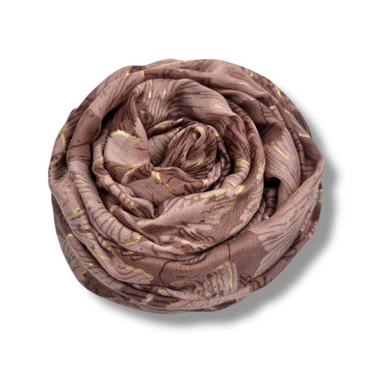 Dusty pink floral scarf with gold foil detail rolled up