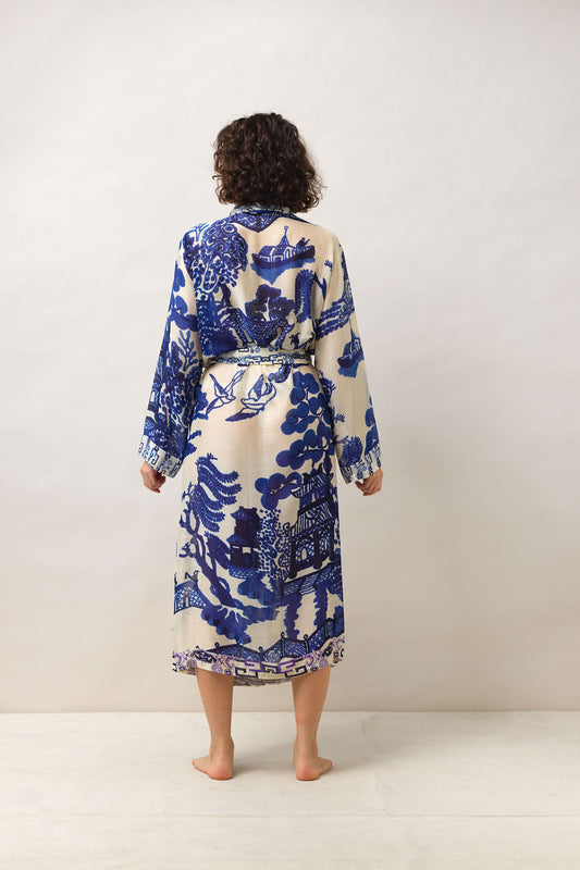 One Hundred Stars Giant Willow Blue Gown featuring an elegant willow print in soft blue tones.