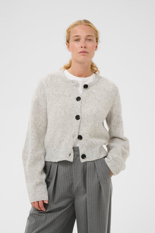Woman wearing the InWear Nias Cardigan in grey with black buttons