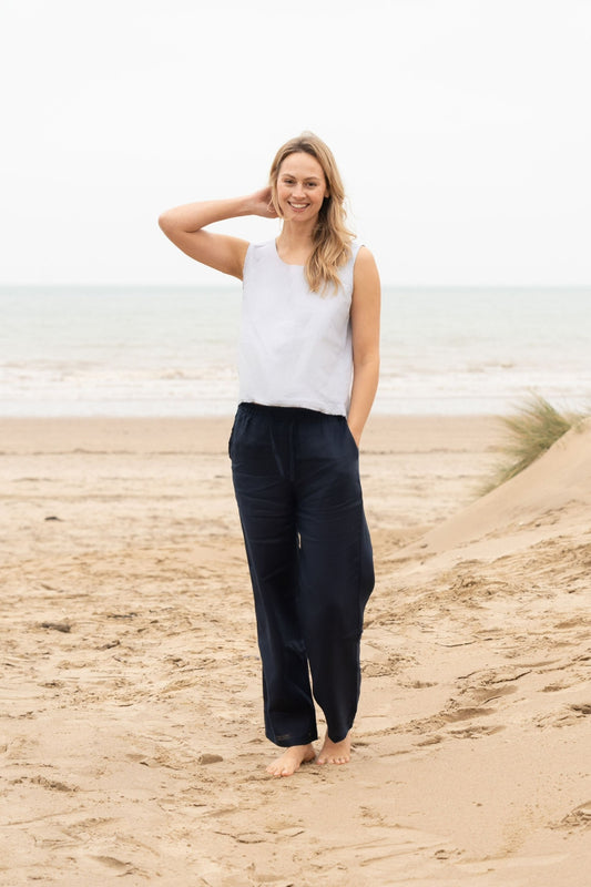 woman wearing the Millie Navy blue linen trousers