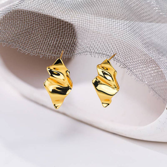 Molten sculptural gold drop stud earring in 18kt gold-plated brass with post-back fastening.