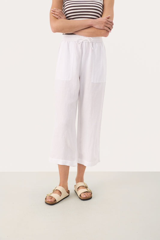 Woman wearing Part Two Eniolas Cropped White Linen Trousers
