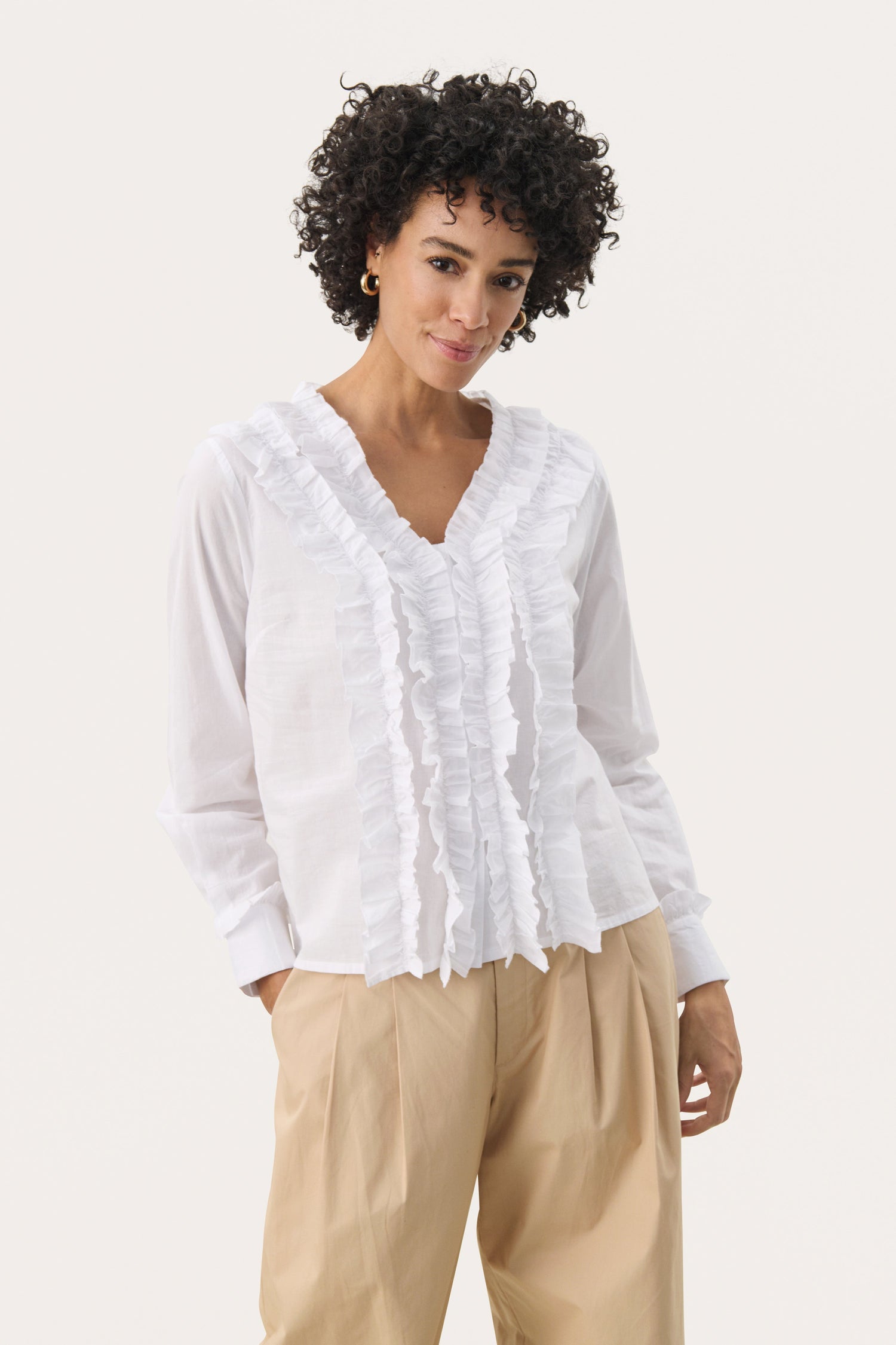 Our stunning new collection of tops, including jumpers, shirts, blouses, and T-shirts. Featuring beautiful designs, luxurious fabrics, and versatile styles, these pieces are perfect for both dressing up and casual wear.