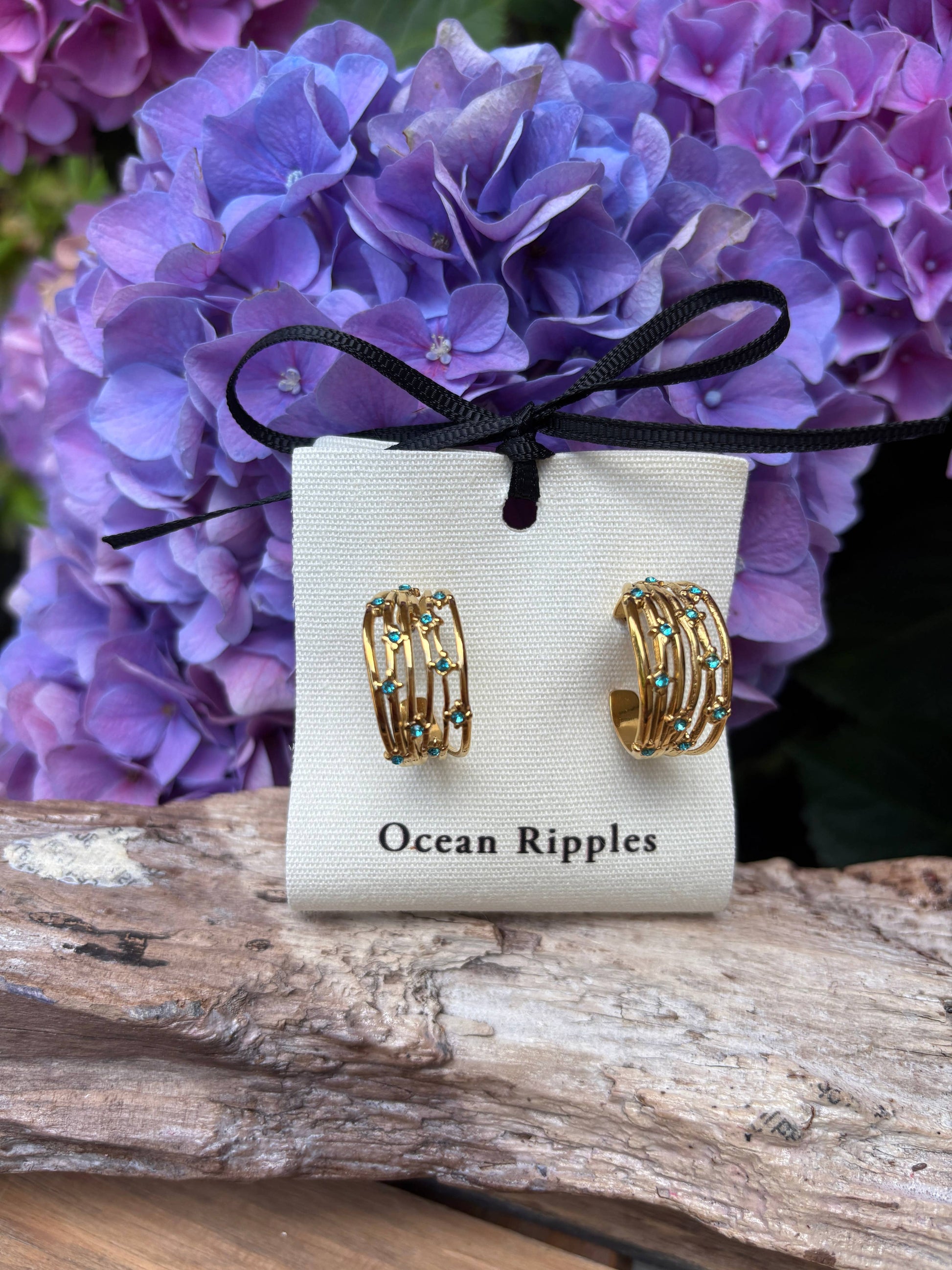 18ct Gold Plated Blue Cubic Zirconia Multi Strand Earrings on branded ocean ripples card