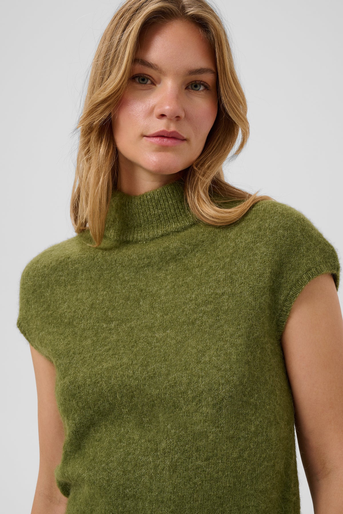 Soaked in Luxury Anina Top in Loden Green Melange with sleeveless design and roll neck
