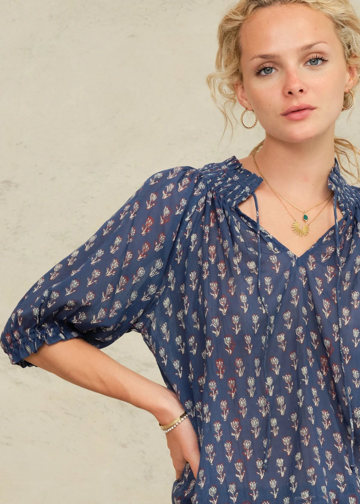 Indigo M.A.B.E Ari short sleeved blouse in indigo colour with white pattern on it