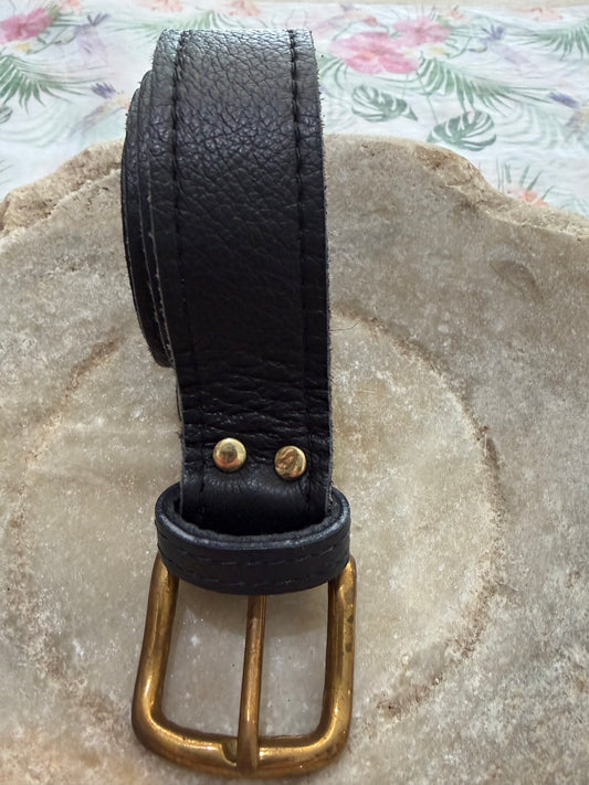 Black leather belt with gold buckle