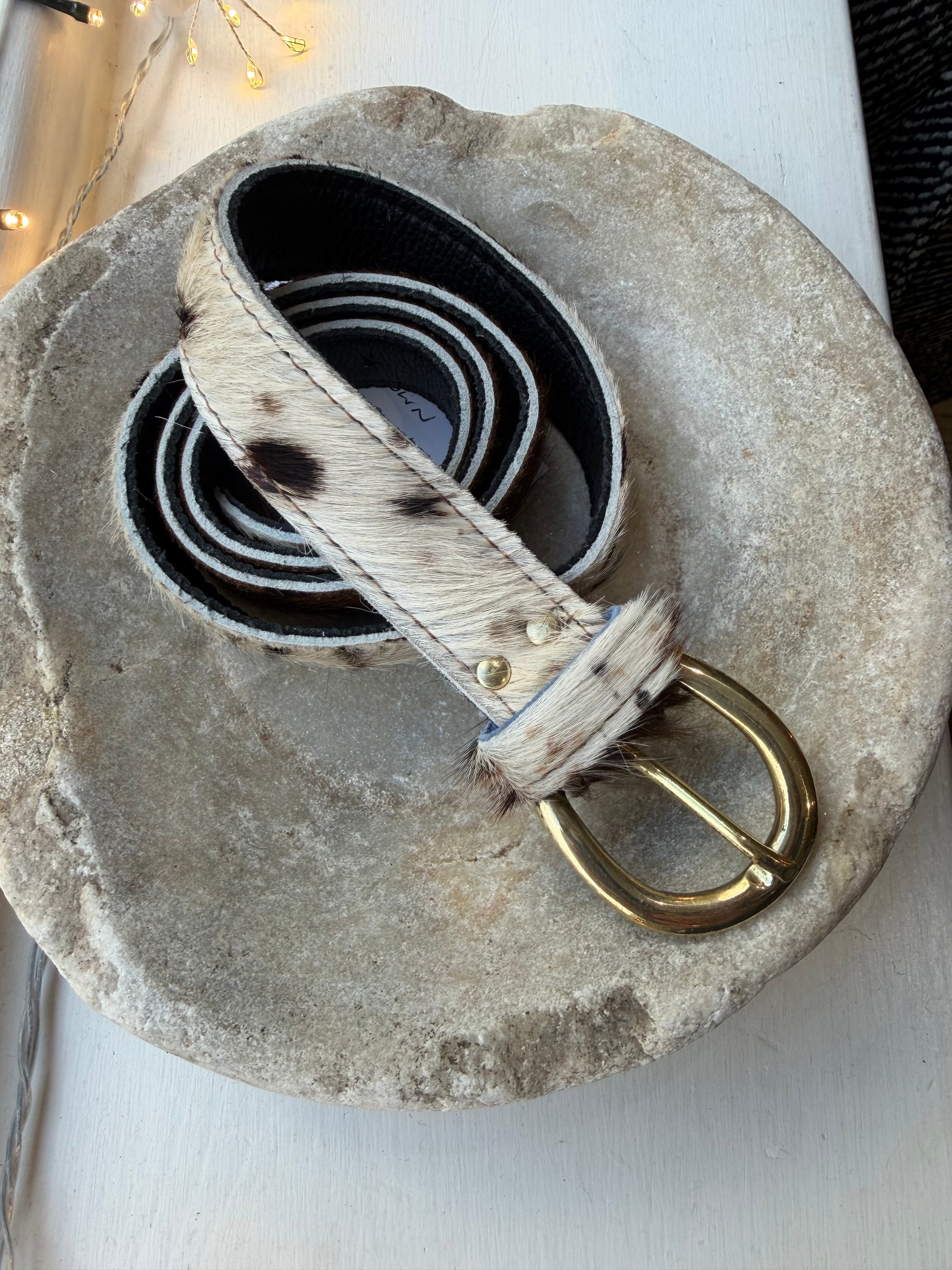 Brown cow print leather belt