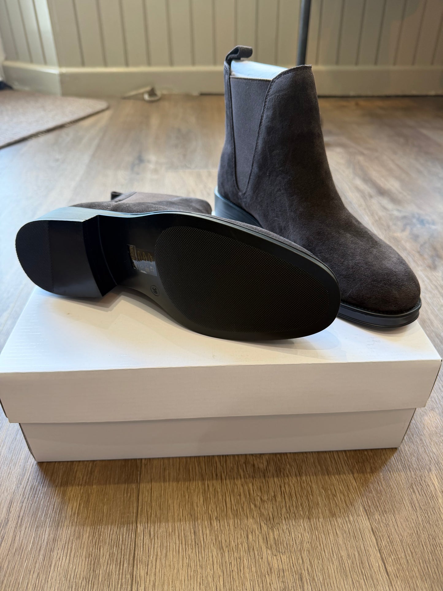 Another Trend Cafe suede-look Chelsea ankle boots featuring elasticated side panels, pull tabs and low black block heel.