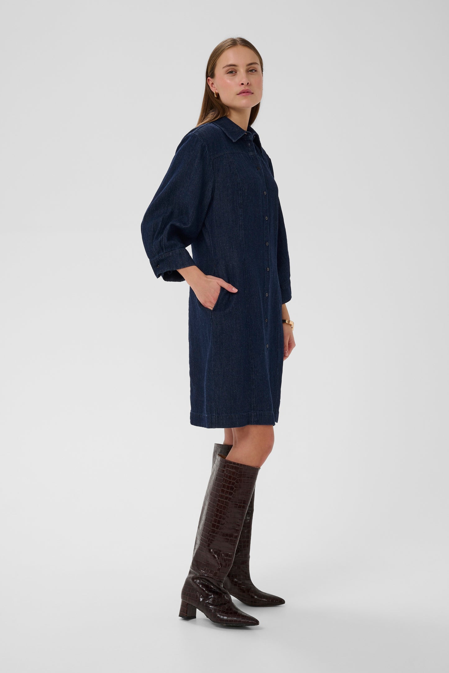 woman wearing the Soaked In luxury Charam Denim knee length dress