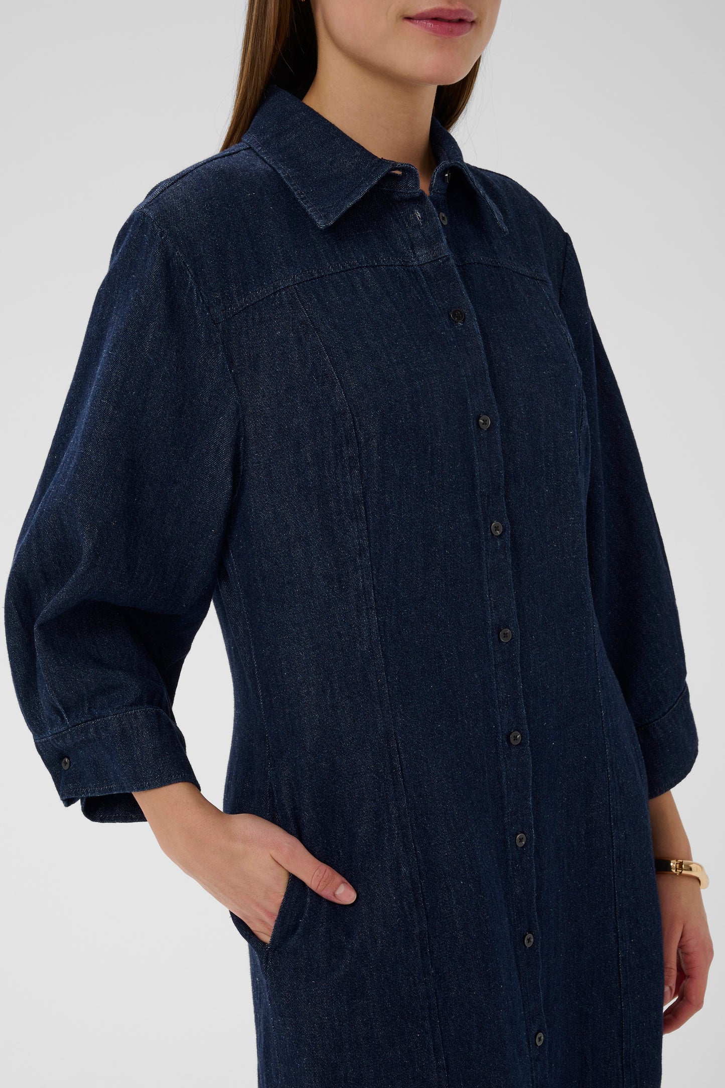 woman wearing the Soaked In luxury Charam Denim knee length dress