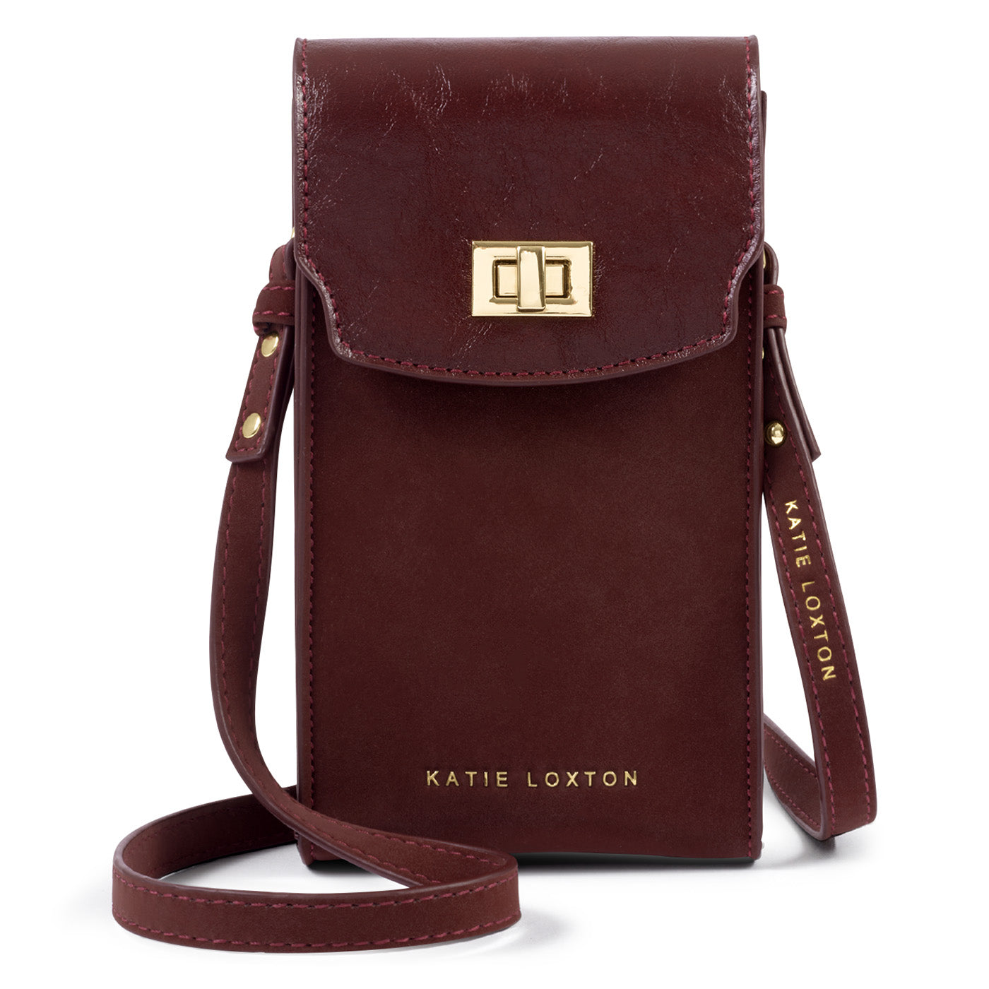 Katie Loxton Orin Twist Lock Slim Bag in cherry with gold twist lock fastening and adjustable crossbody strap.