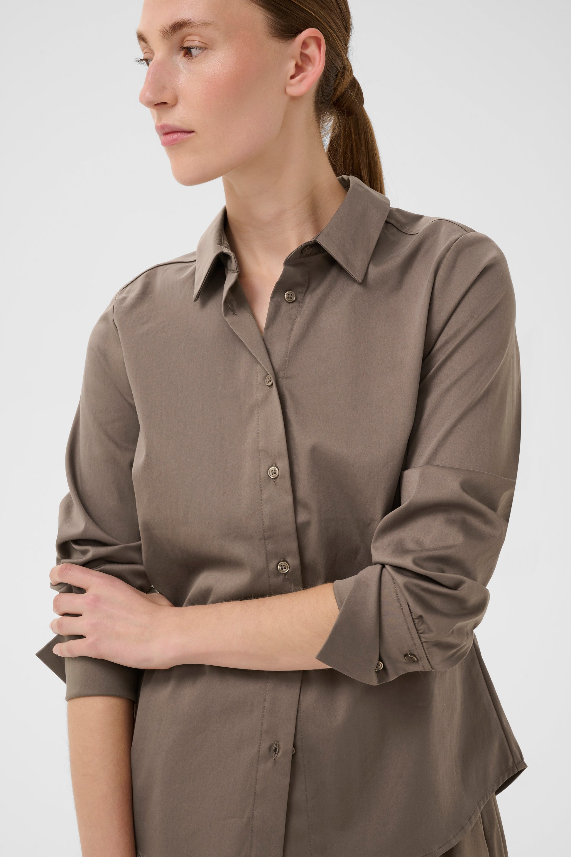 Inwear shirt in mud brown colour.  Long sleeves with collar