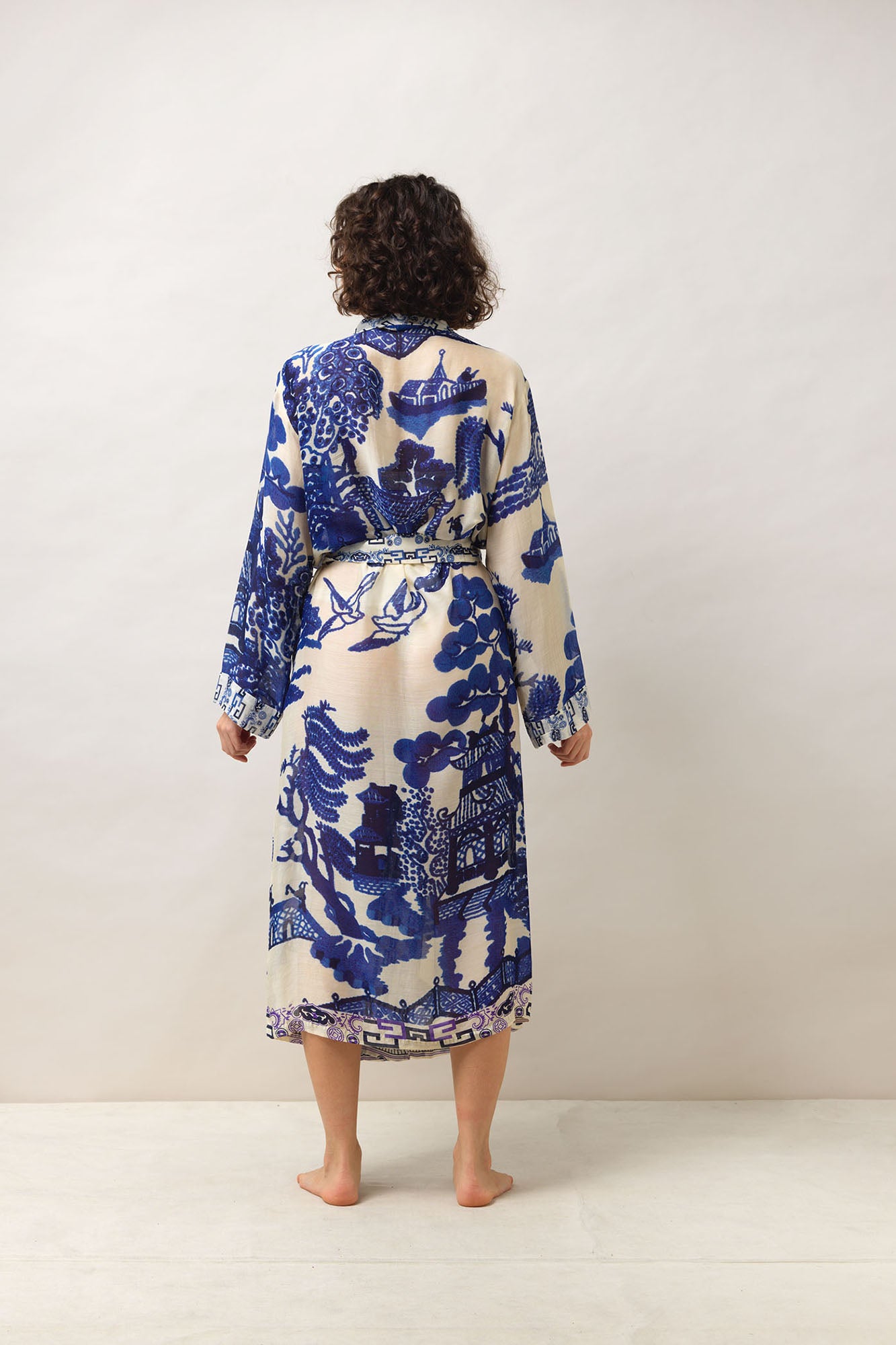 One Hundred Stars Giant Willow Blue Gown featuring an elegant willow print in soft blue tones.