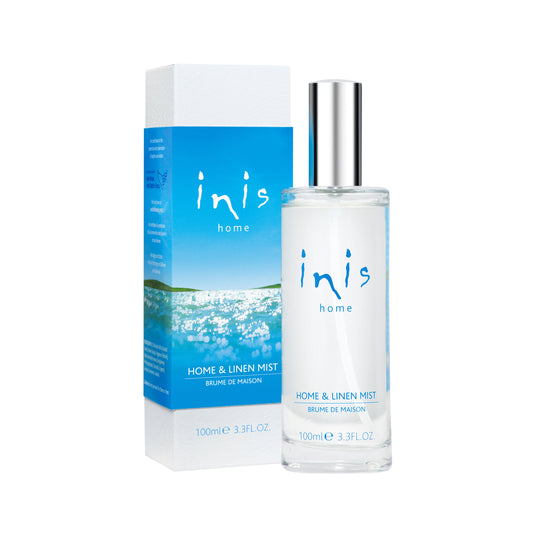 Bottle of Inis home and Linen Mist with the box which is blue and has a picture of the sea on.