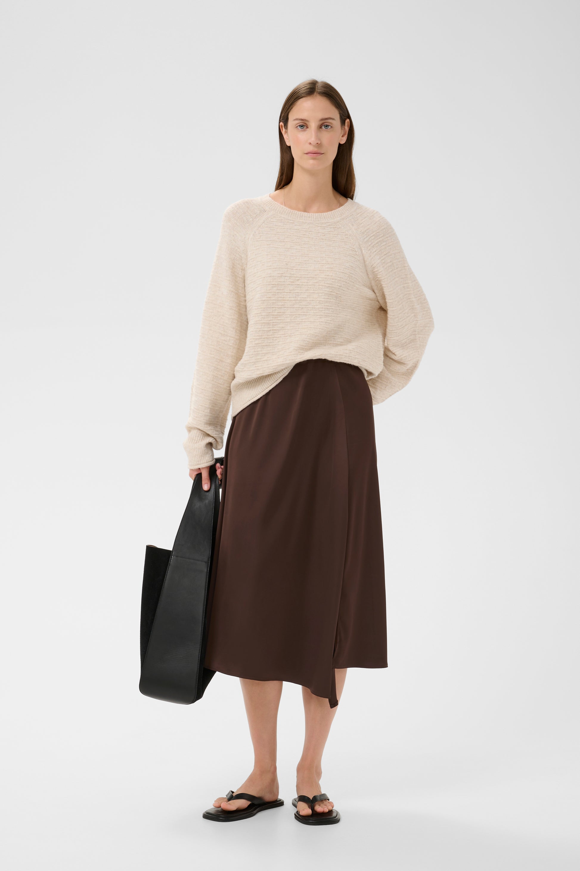 Woman wearing the InWear Lake Satin Skirt in Coffe bean 