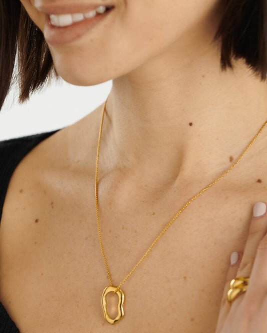 Katie Loxton Hera necklace in waterproof gold on model