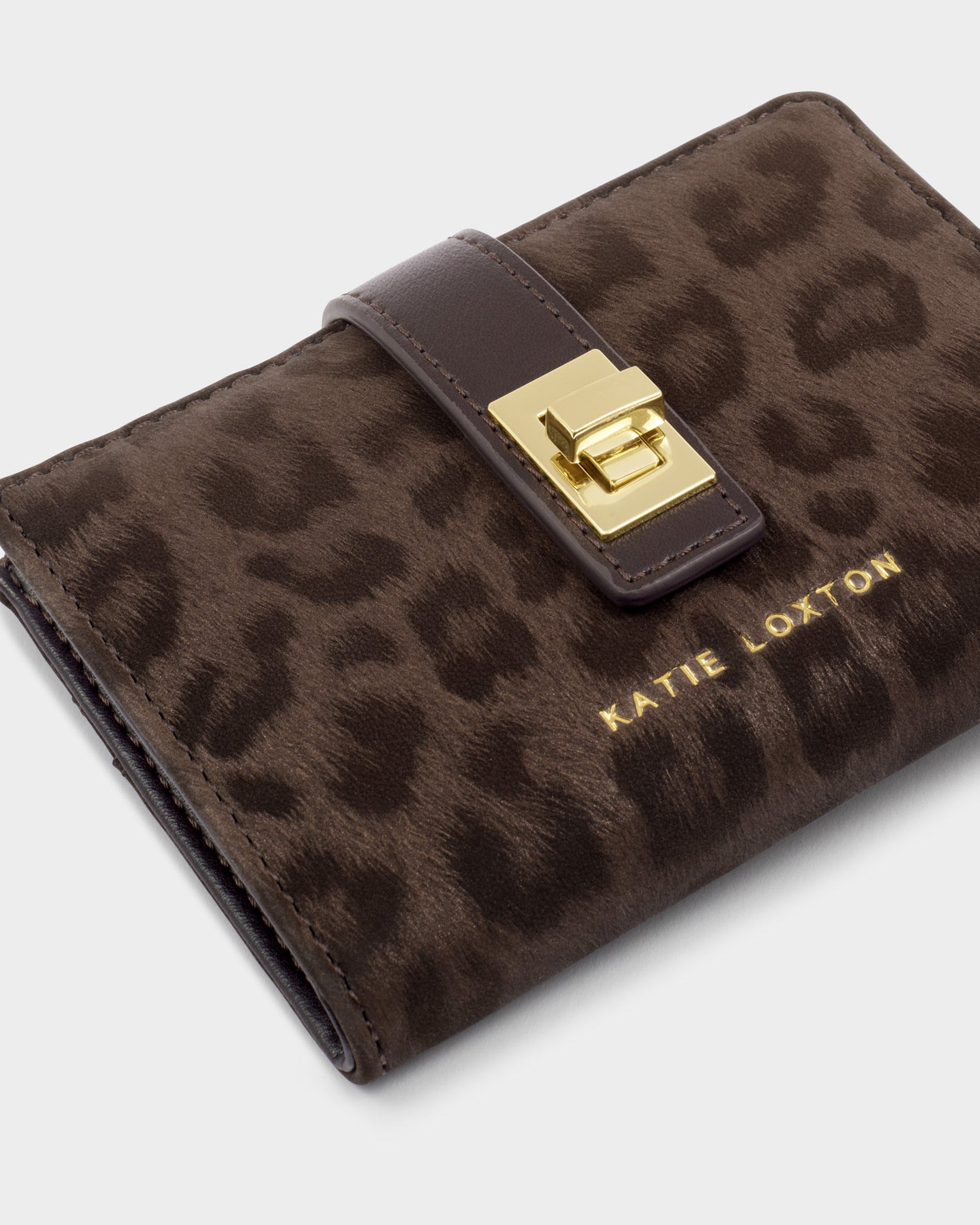 Katie Loxton Orin Twist Lock Purse available in Black Crocodile, Bitter Chocolate Suedette and Chocolate Leopard.