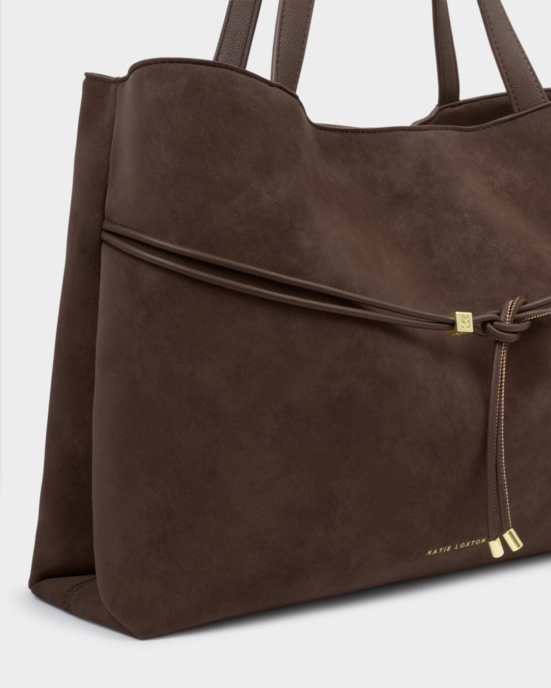 Katie Loxton Lori Tote Bag available in Bitter Chocolate Suedette and Cherry Suedette with a spacious everyday design.