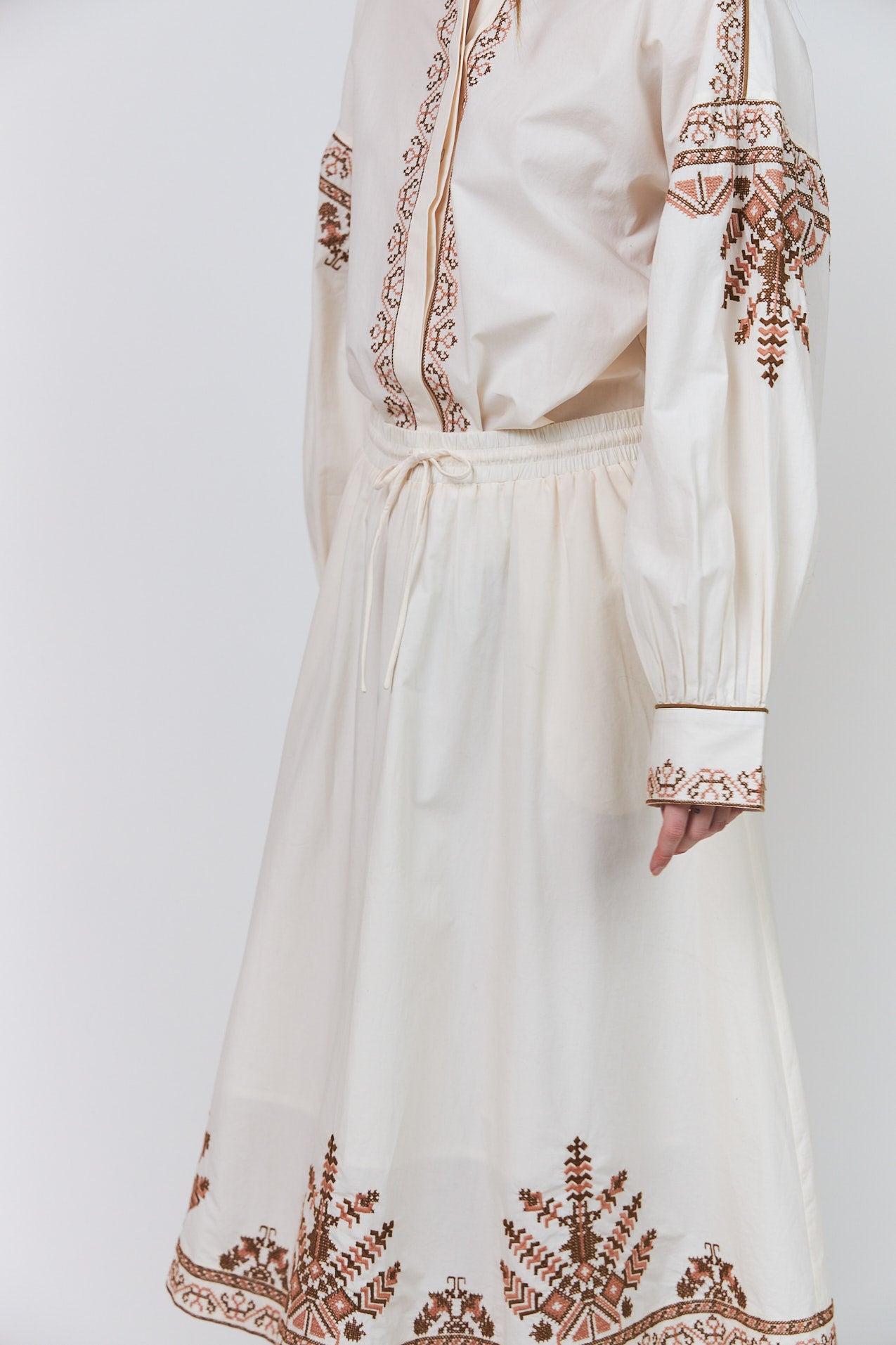 Lollys Laundry Lucia Shirt in Creme with intricate cinnamon-toned embroidery and concealed button fastening