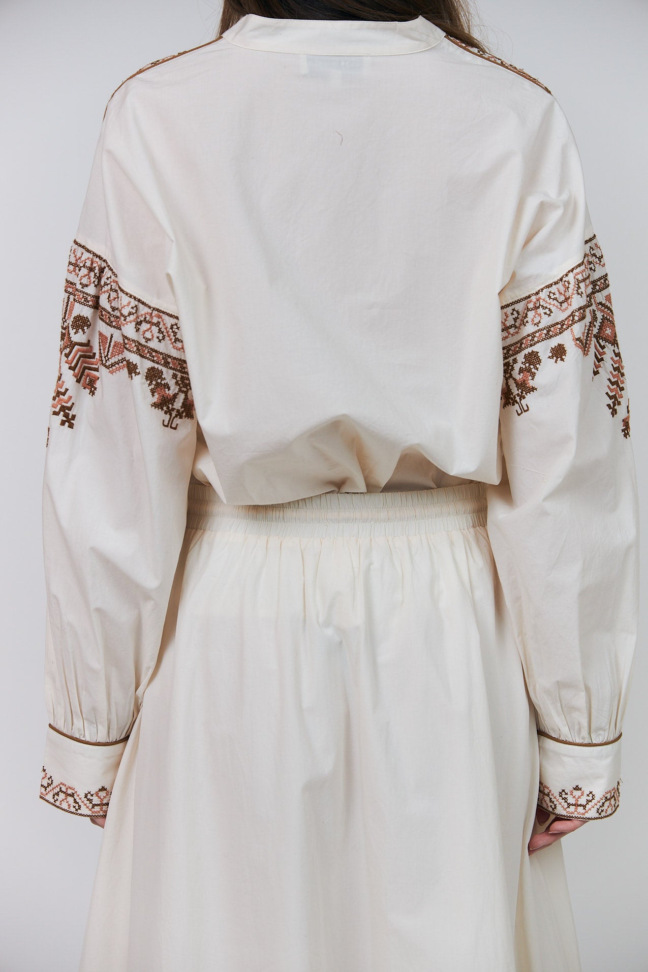 Lollys Laundry Lucia Shirt in Creme with intricate cinnamon-toned embroidery and concealed button fastening
