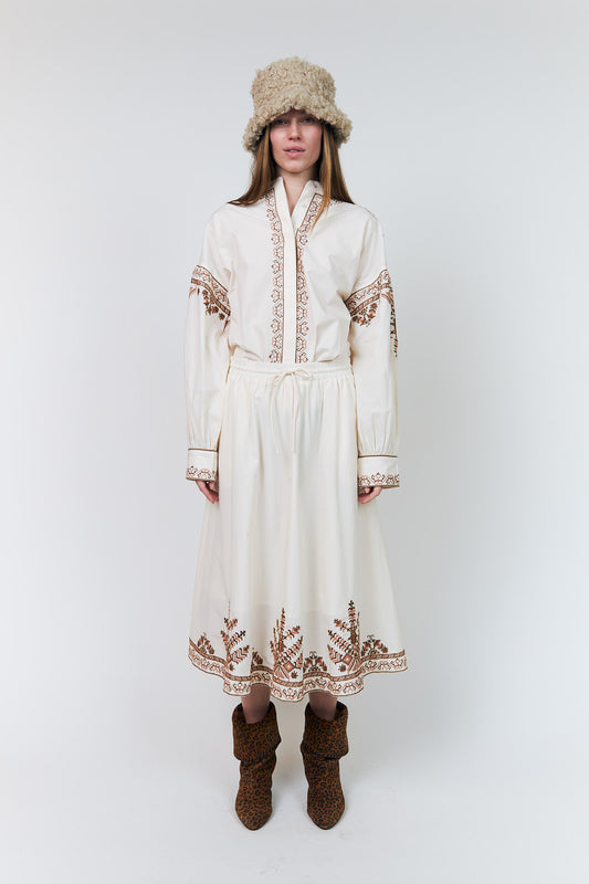 Lollys Laundry Lucia Shirt in Creme with intricate cinnamon-toned embroidery and concealed button fastening