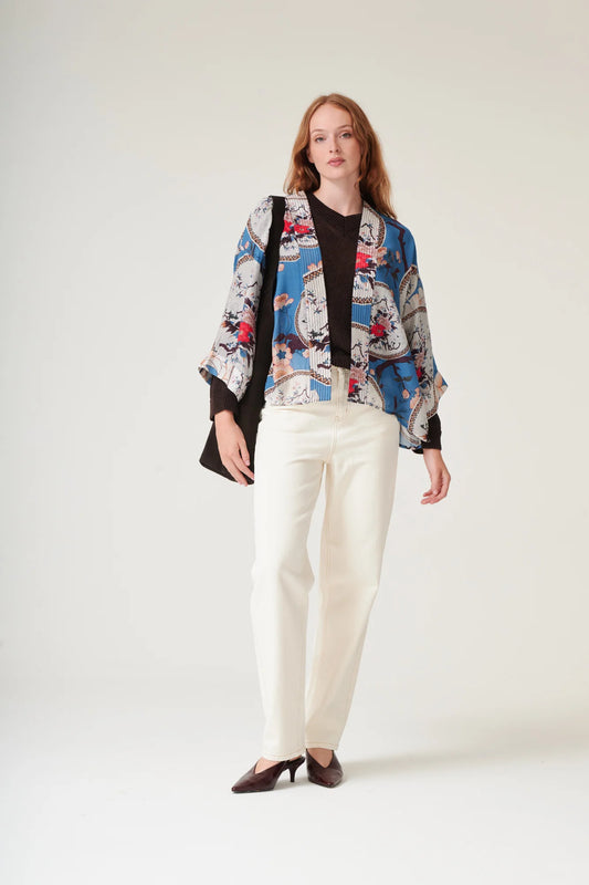 One Hundred Stars Magnolia Plates Blue Kimono featuring an elegant floral print in shades of blue.