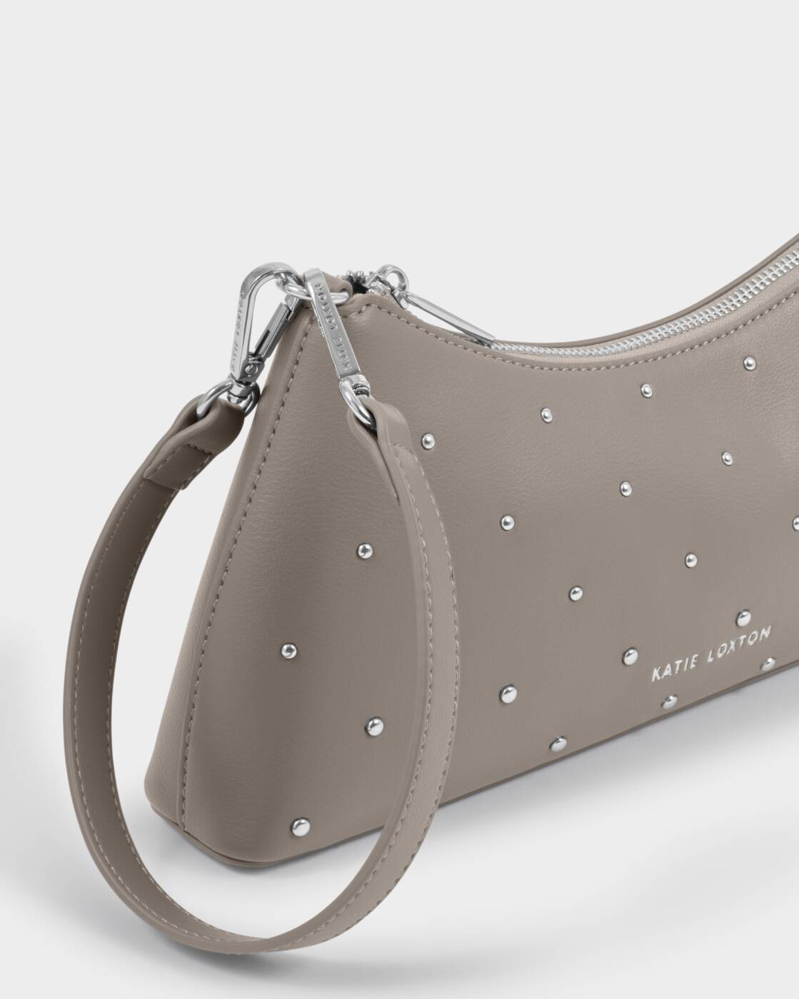 Katie Loxton Miley Small Shoulder Bag in Silver Mink Studded with a sleek silhouette and subtle stud detailing.