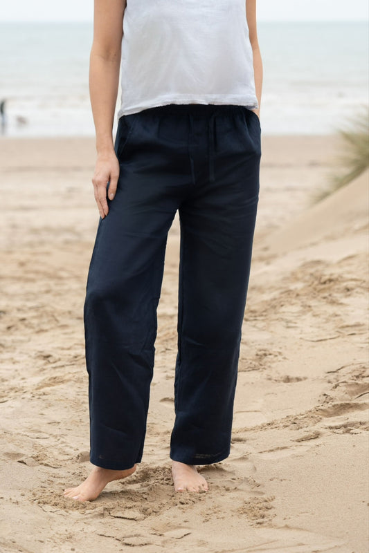 woman wearing the Millie Navy blue linen trousers