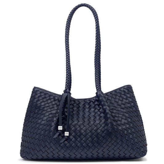 Katie Loxton Nova Navy blue woven handbag with a handle on a white background