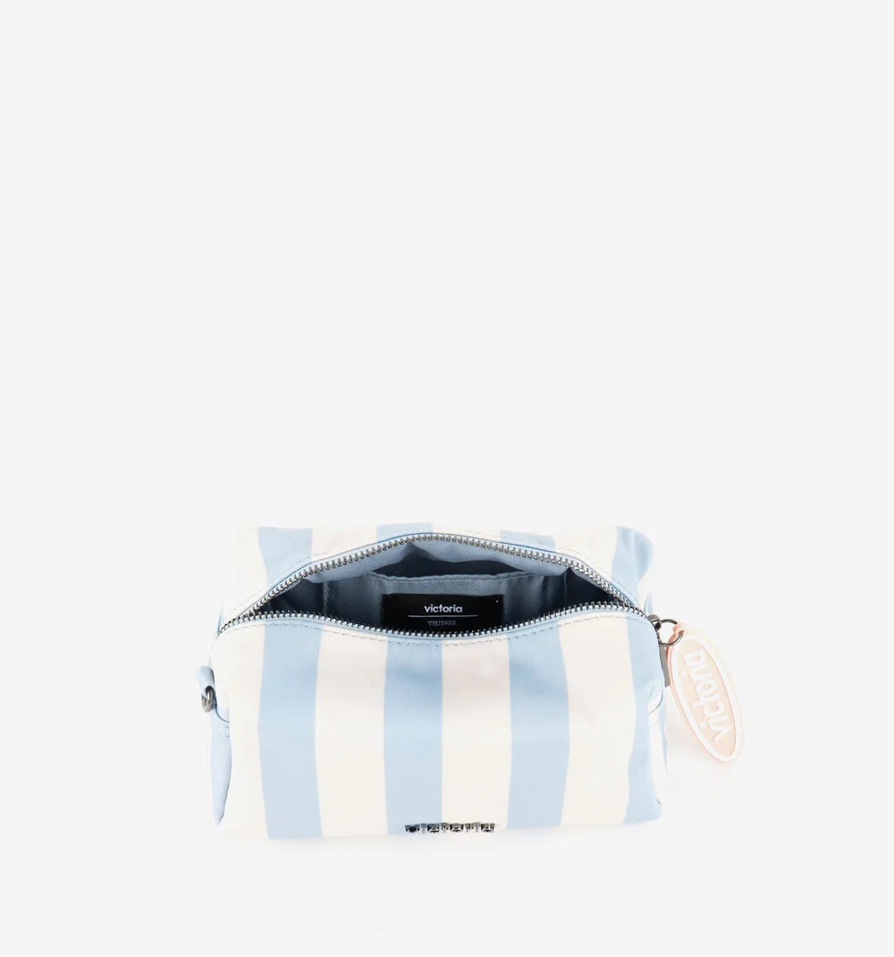 Victoria striped toiletry bag with zip fastening hanging charm and metallic brand plate in azul or amarillo