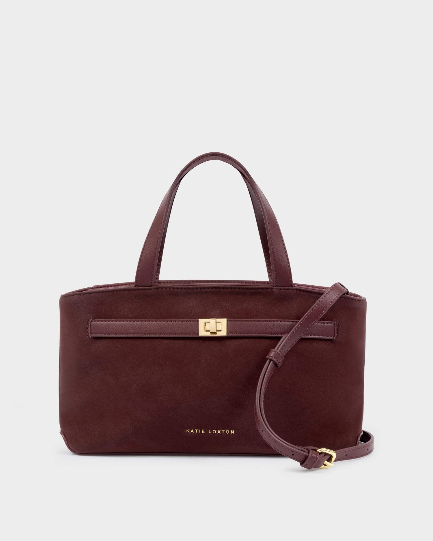 Katie Loxton Orin top handle crossbody bag in cherry suedette with gold hardware and detachable crossbody strap.
