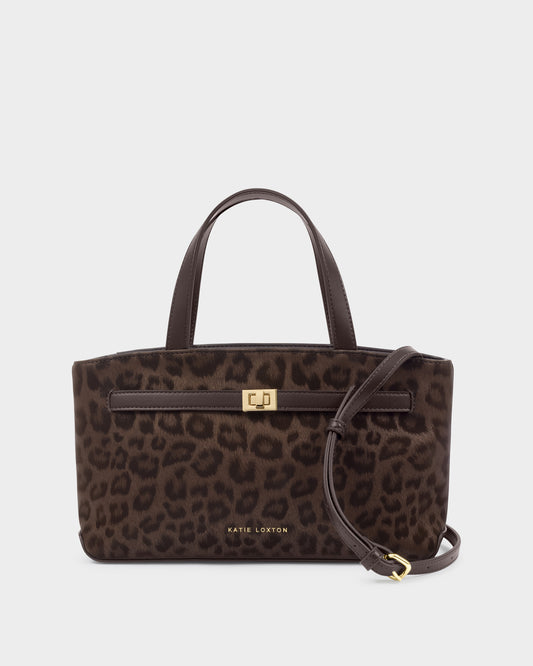 Katie Loxton Orin top handle crossbody bag in chocolate leopard with structured silhouette, gold hardware and detachable crossbody strap.