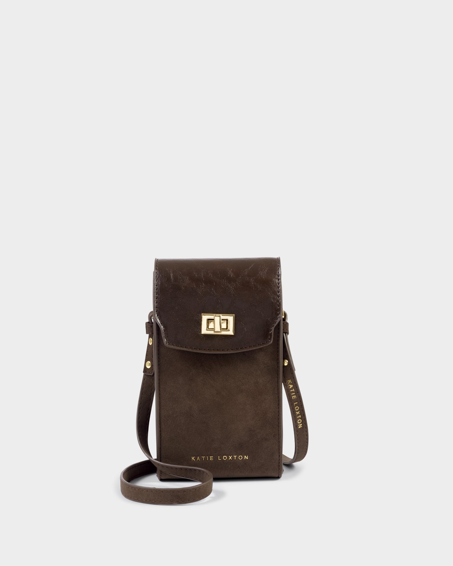 Katie Loxton Orin Twist Lock Slim Bag in bitter chocolate with gold twist lock fastening and adjustable crossbody strap.