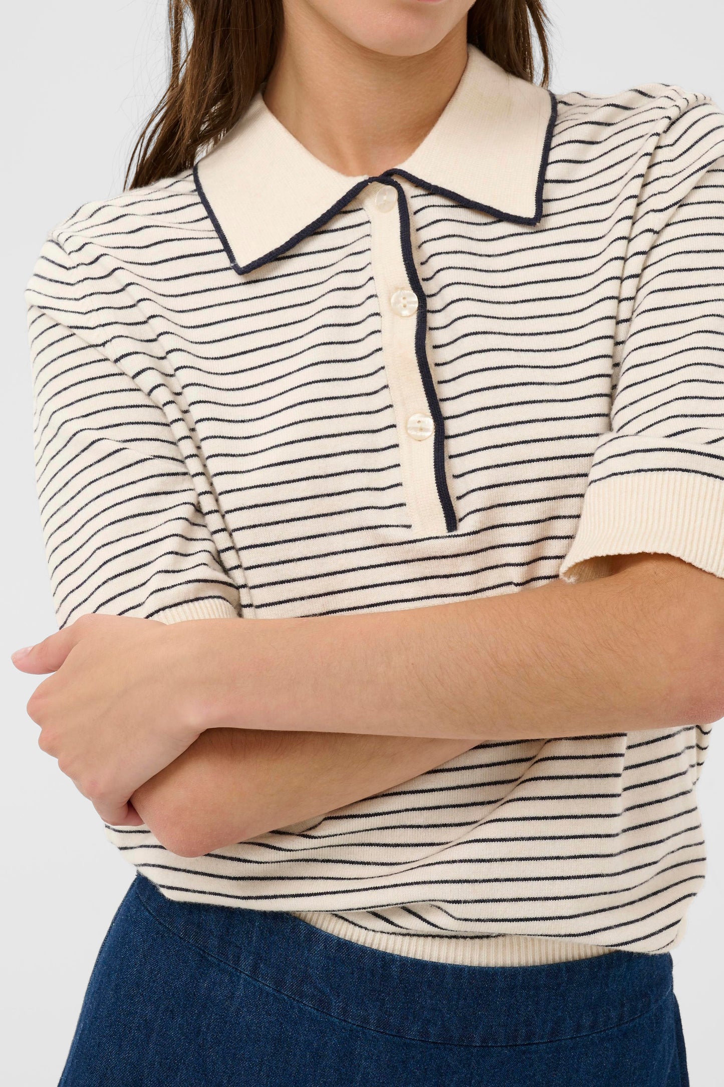 Woman wearing the Part Two Anetti white and blue striped short sleeve knit