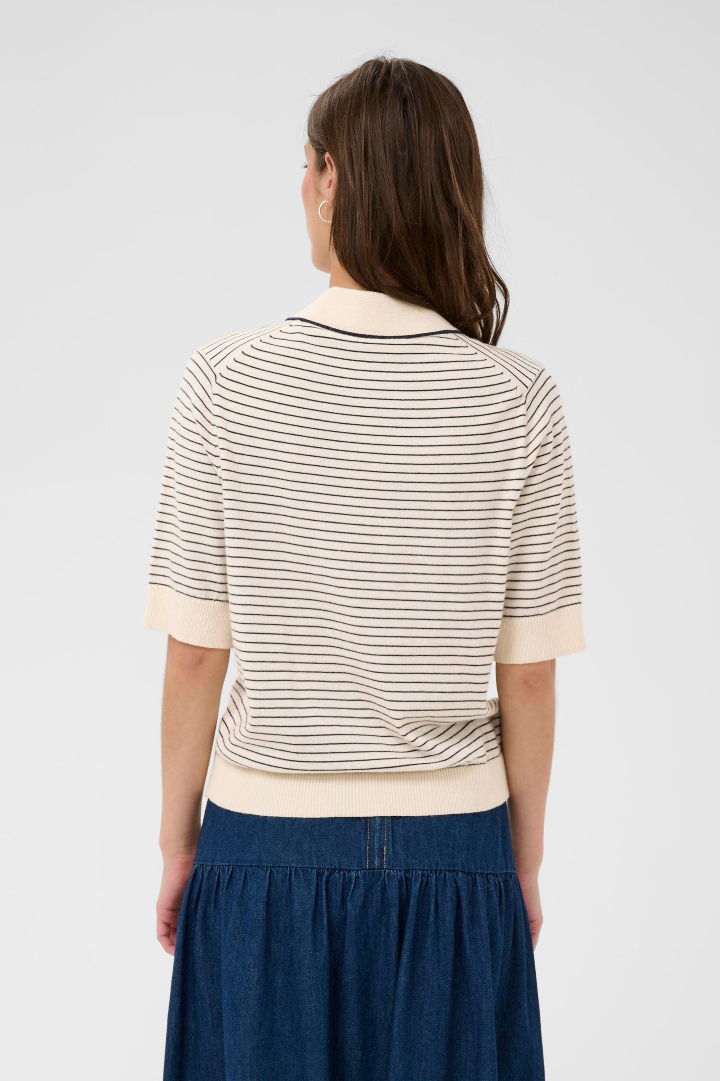 Woman wearing the Part Two Anetti white and blue striped short sleeve knit