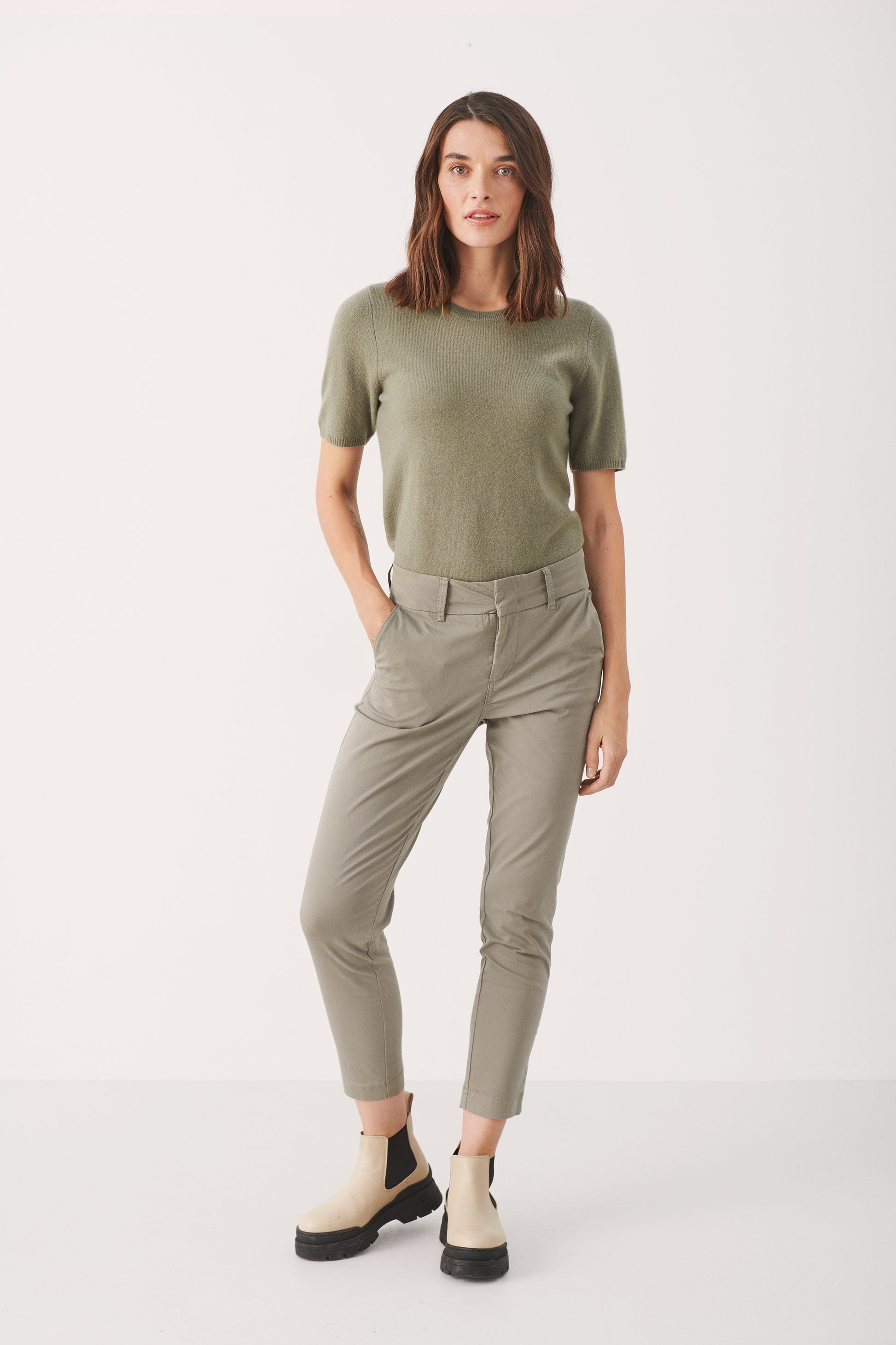 Woman wearing the Part Two Soffys cropped trouser in vetiver green