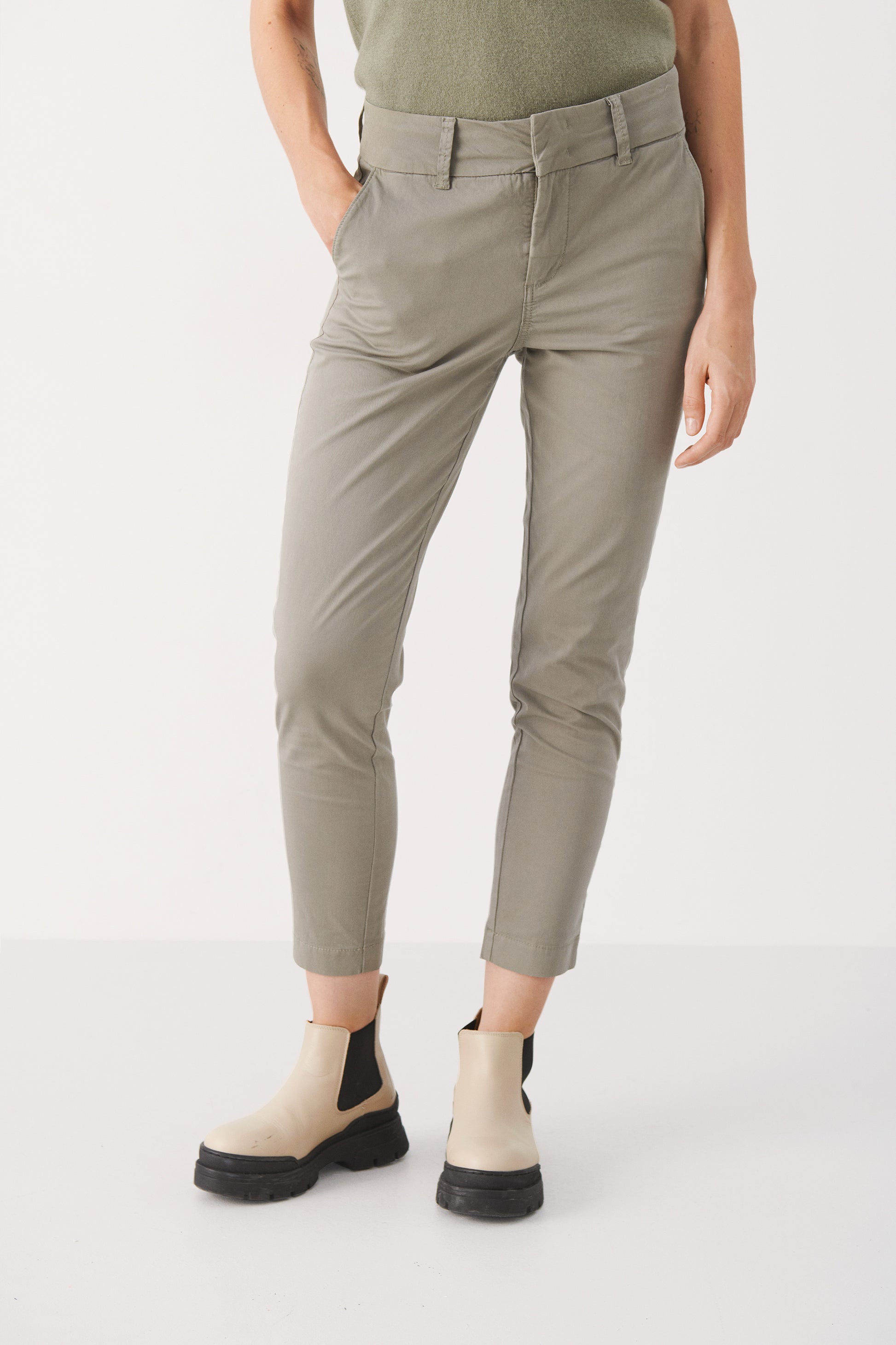 Woman wearing the Part Two Soffys cropped trouser in vetiver green