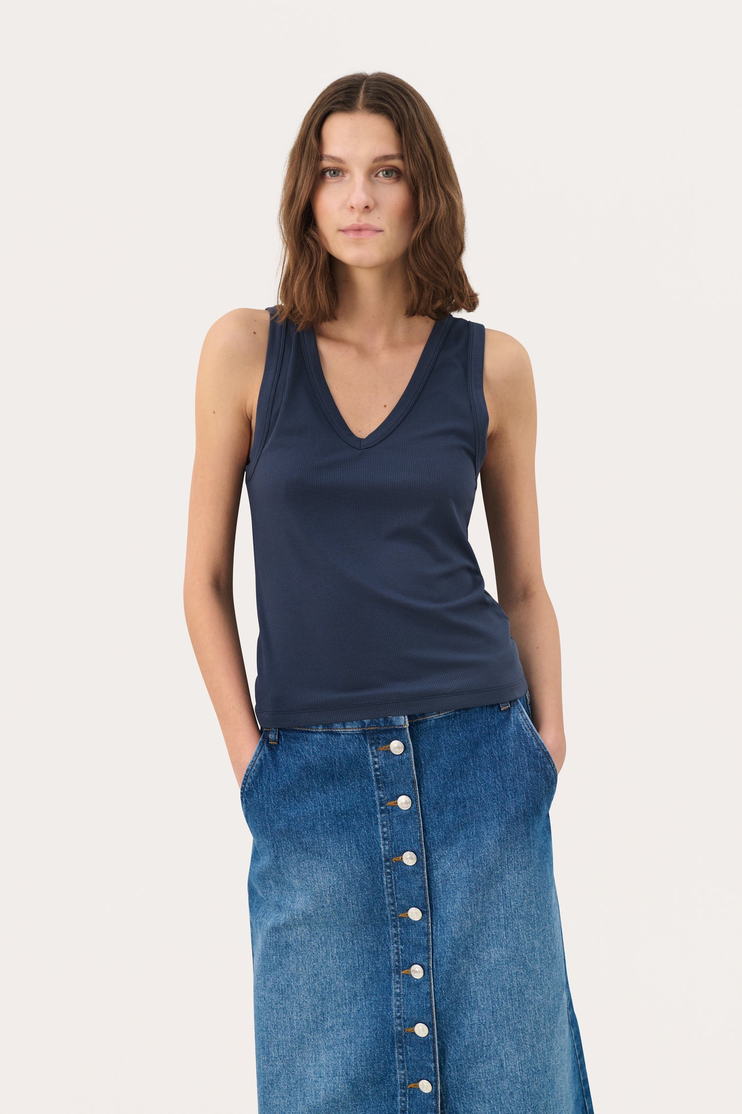 Woman wearing the Part Two Blue tank top