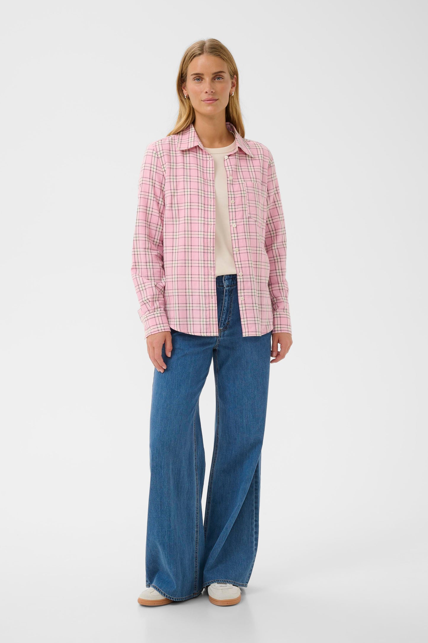 Woman wearing the Part Two Yana Pink Check shirt. 
