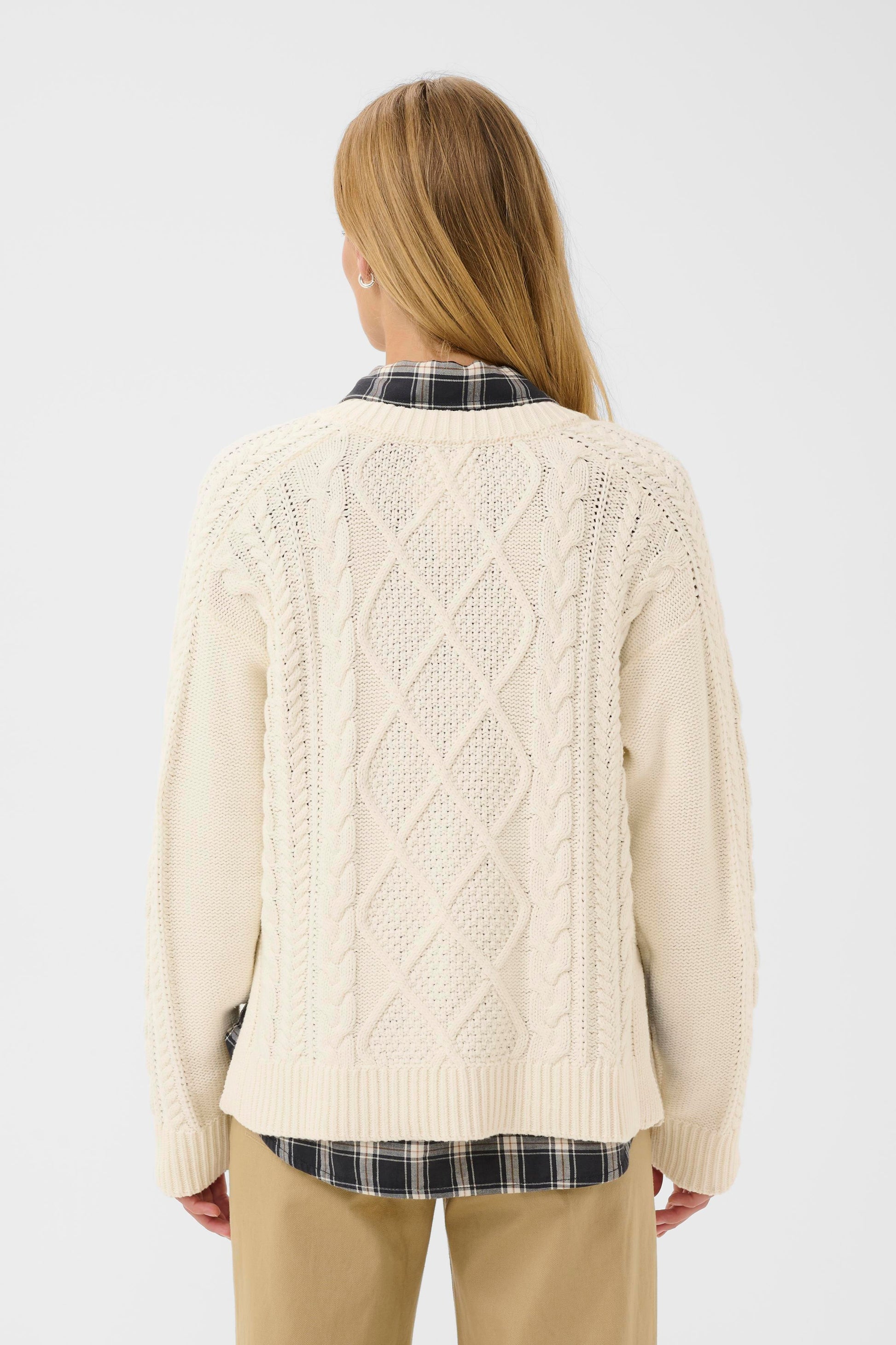 Woman wearing the Part Two Ziva Cable Knitted Jumper in white colour