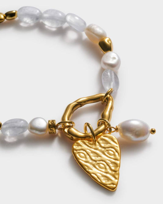 Pearla Solesi Bracelet on white background close up