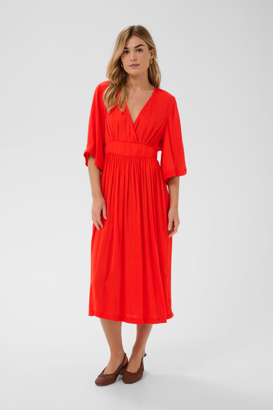 Saint Tropez Dress in striking red colour with 3/4 length sleeves, v-neck and midi length