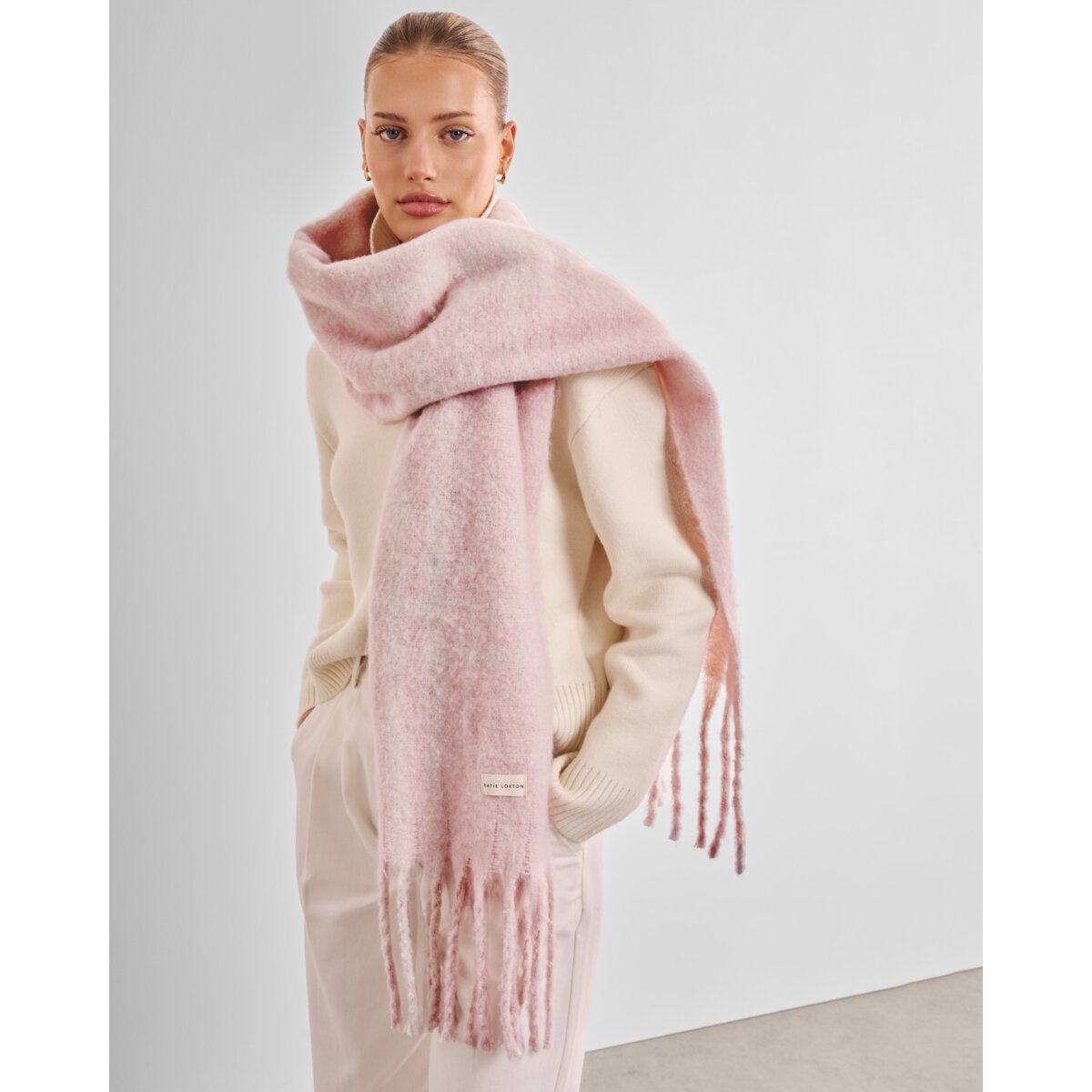 Katie Loxton Recycled Striped Tassel Scarf in Blush Pink and White Plaid