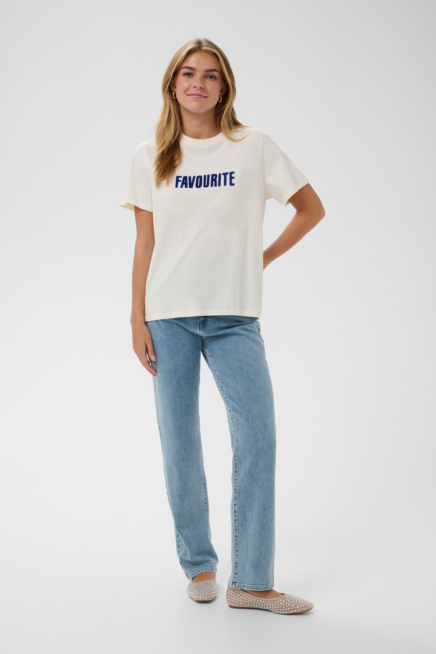 Cream Saint Tropez t-shirt with 'FAVOURITE' printed in blue on a white background