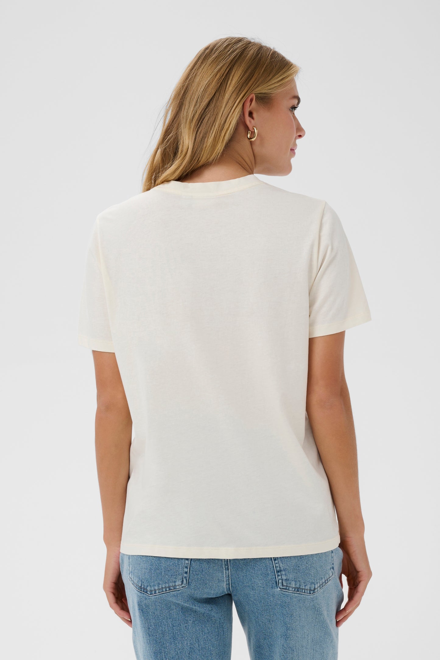 Cream Saint Tropez t-shirt with 'FAVOURITE' printed in blue on a white background