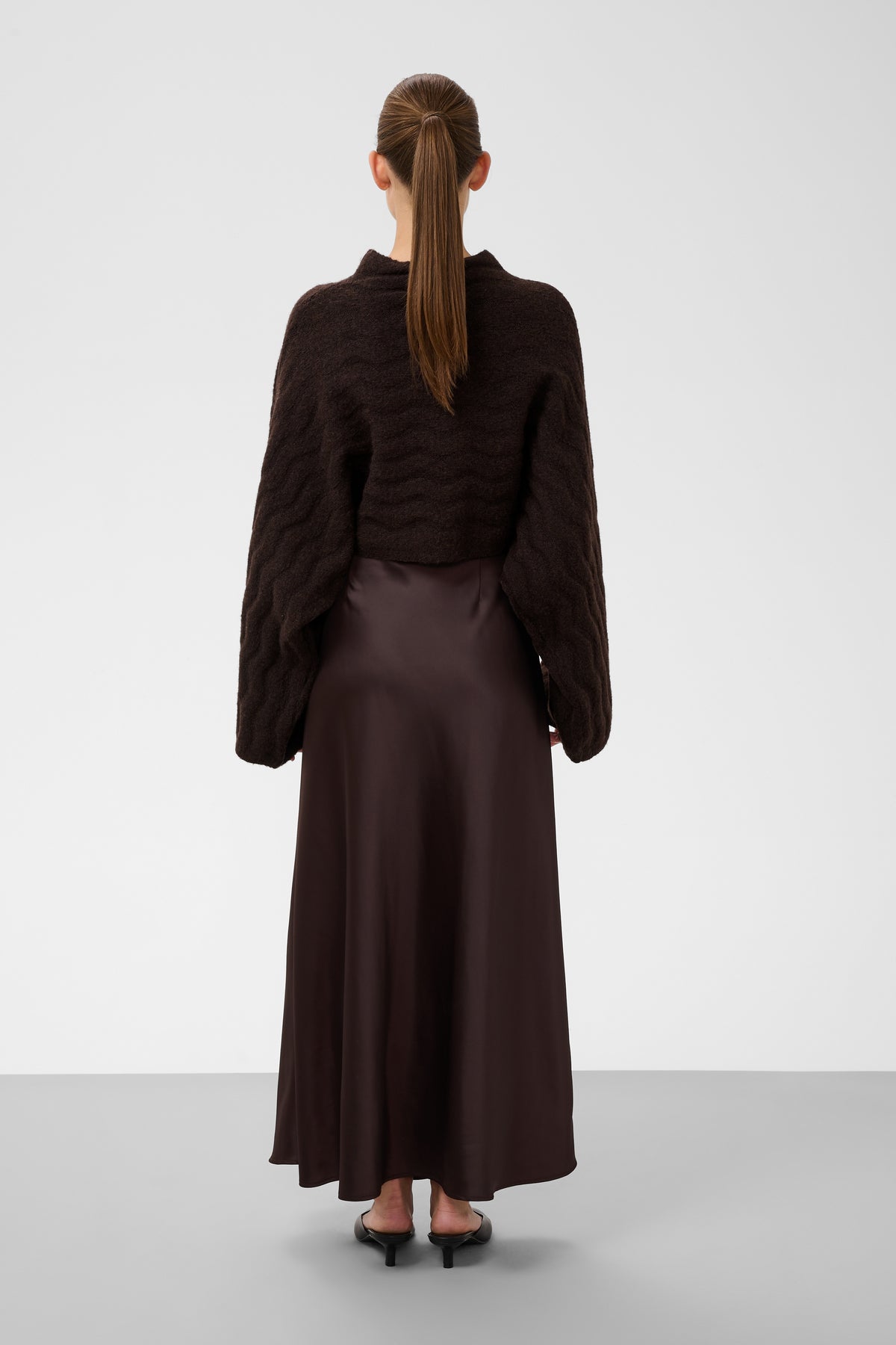 Soaked in Luxury Idalia Poncho Pullover in Ganache Melange with soft drape neckline and relaxed poncho silhouette