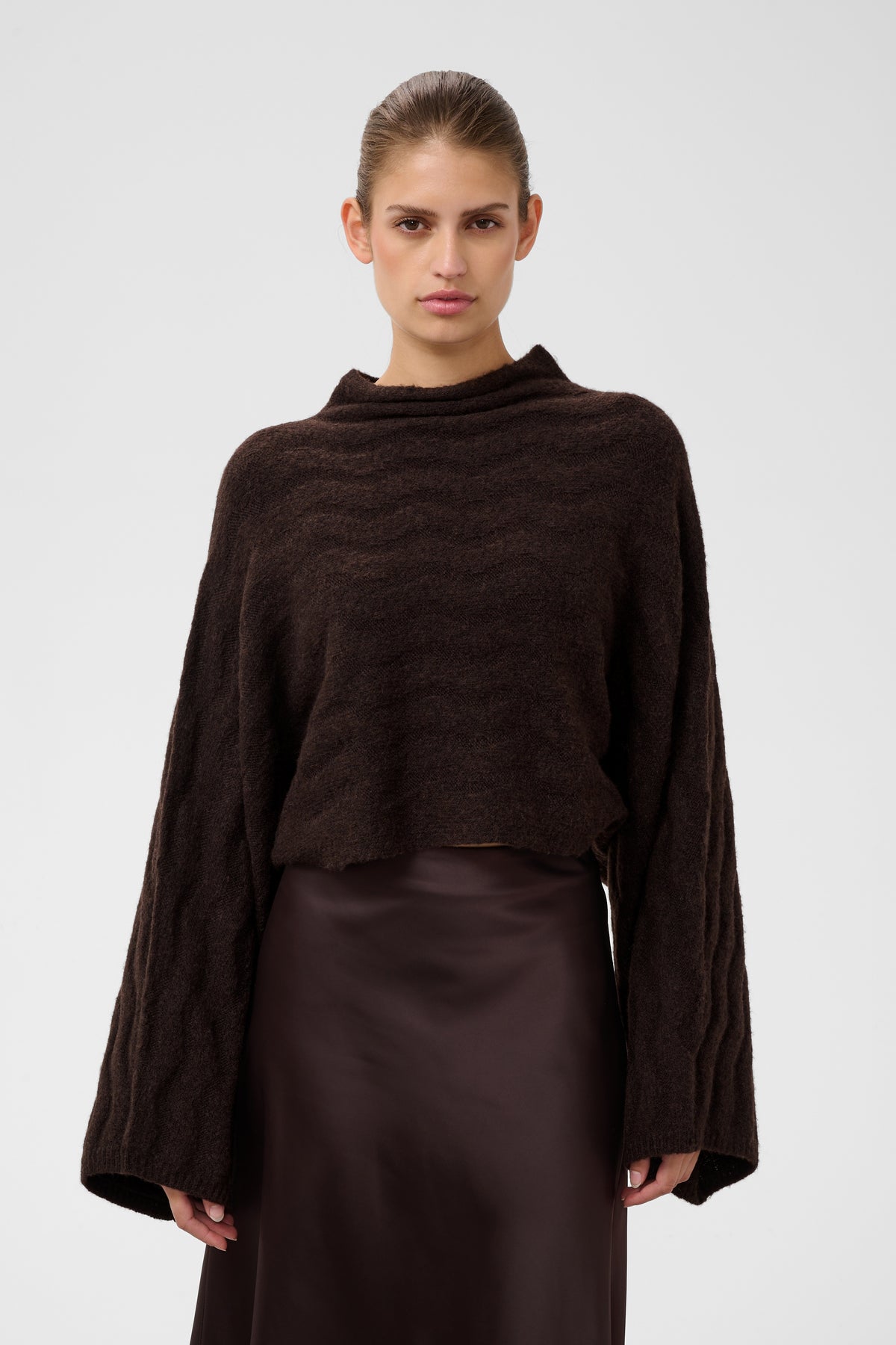 Soaked in Luxury Idalia Poncho Pullover in Ganache Melange with soft drape neckline and relaxed poncho silhouette