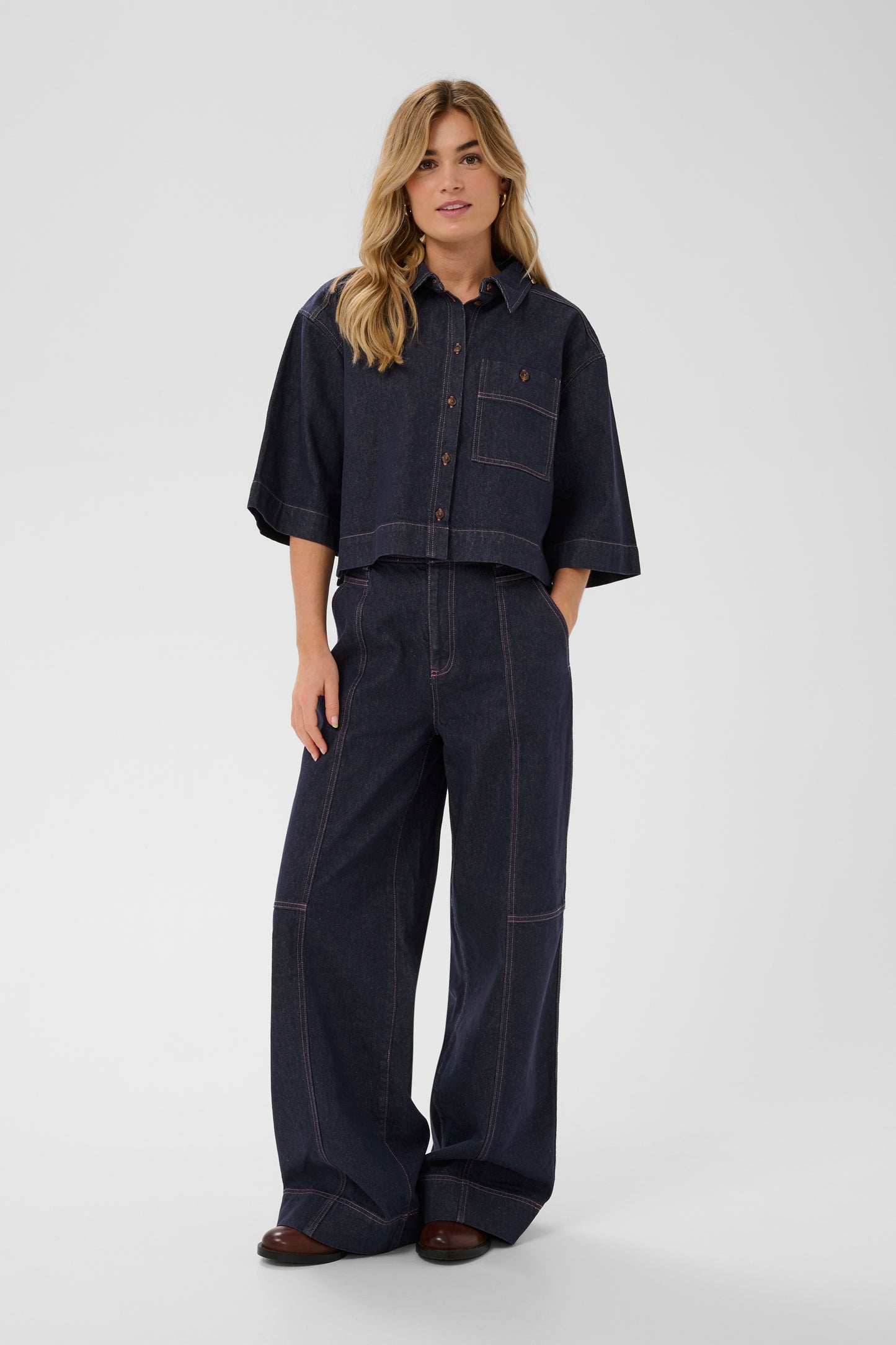 Woman wearing the Saint Tropez Denim Posey Shirt